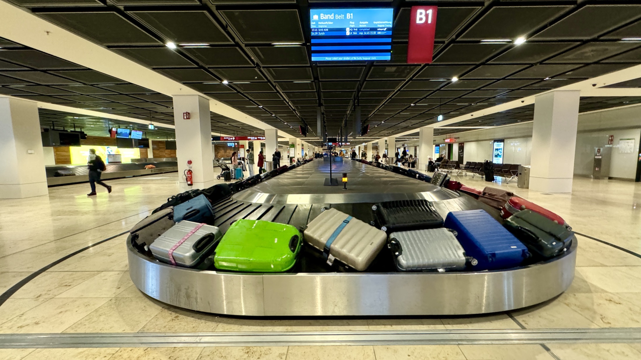 Airport baggage carousel with luggage